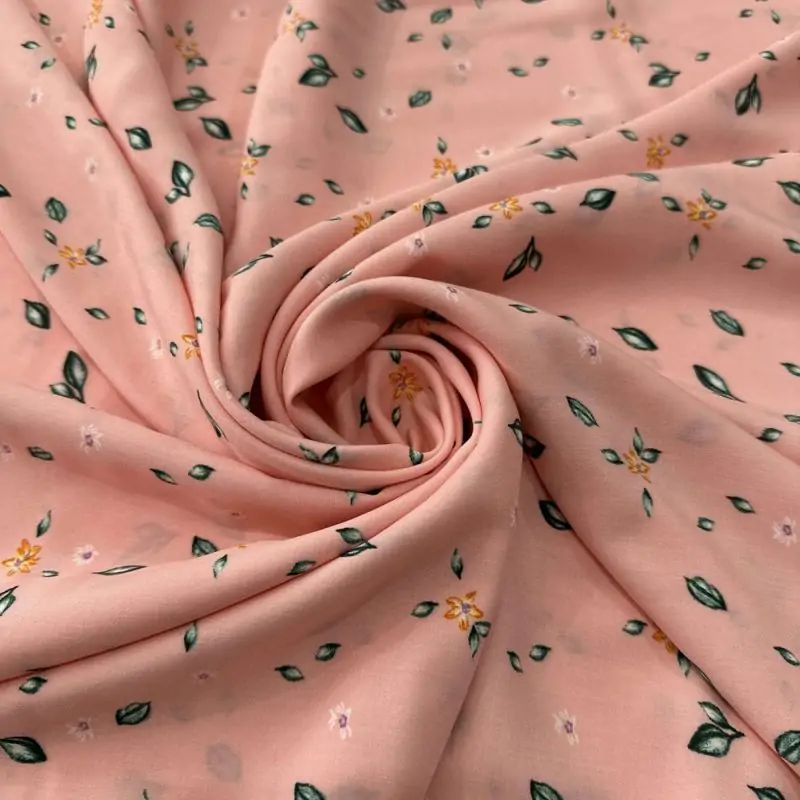 Tecido Viscose Estampada Micro Floral e Fundo Rosa Creme • Luema