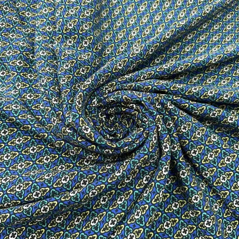 Tecido Viscose Estampada Micro Floral Colorido Fundo Azul • Luema